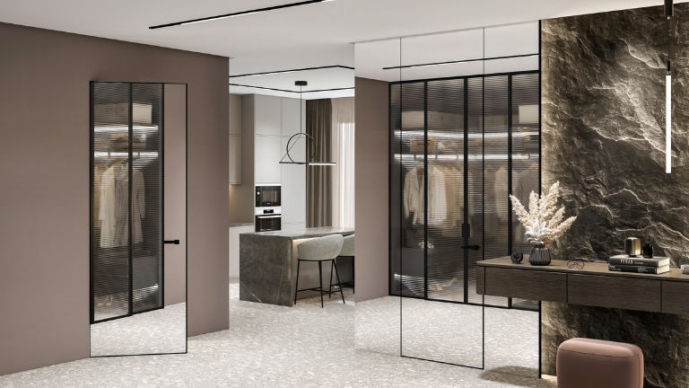 Стильный интерьер с гардеробной со стеклянными дверями и столиком у стены.