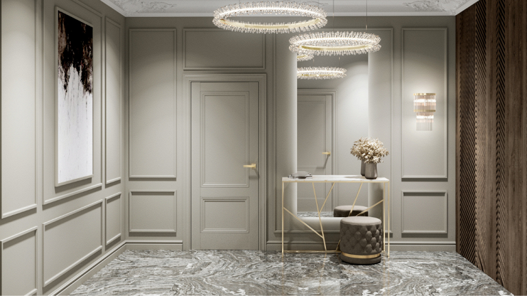 Современный интерьер со светлой дверью, золотой фурнитурой и мраморным полом.